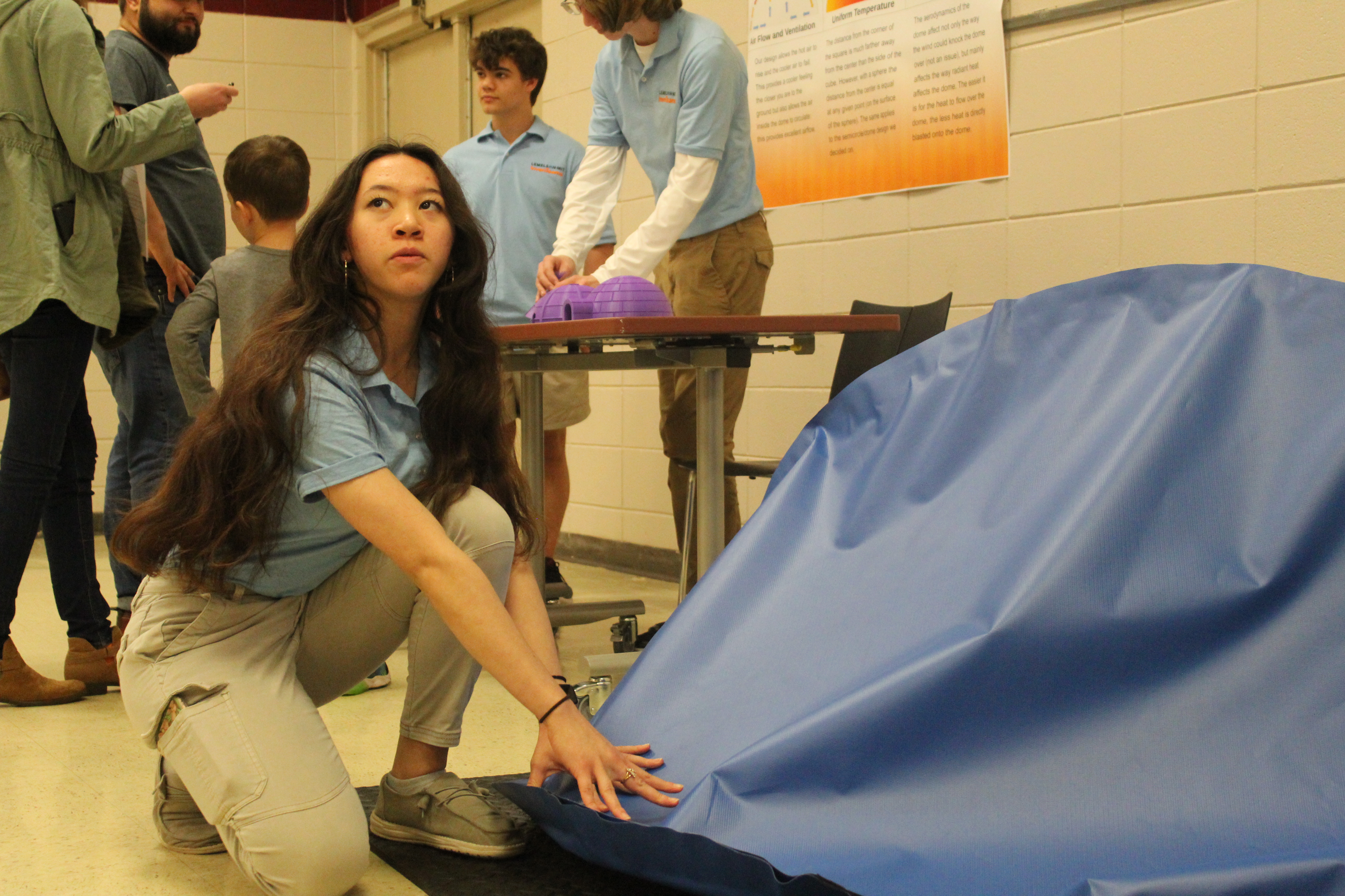 This is a picture of team member AnnElise Kuy heading inside of our practice shelter during our MGTR