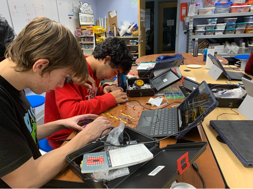 team works on circuits