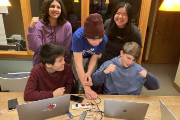 InvenTeam members celebrating a successful test