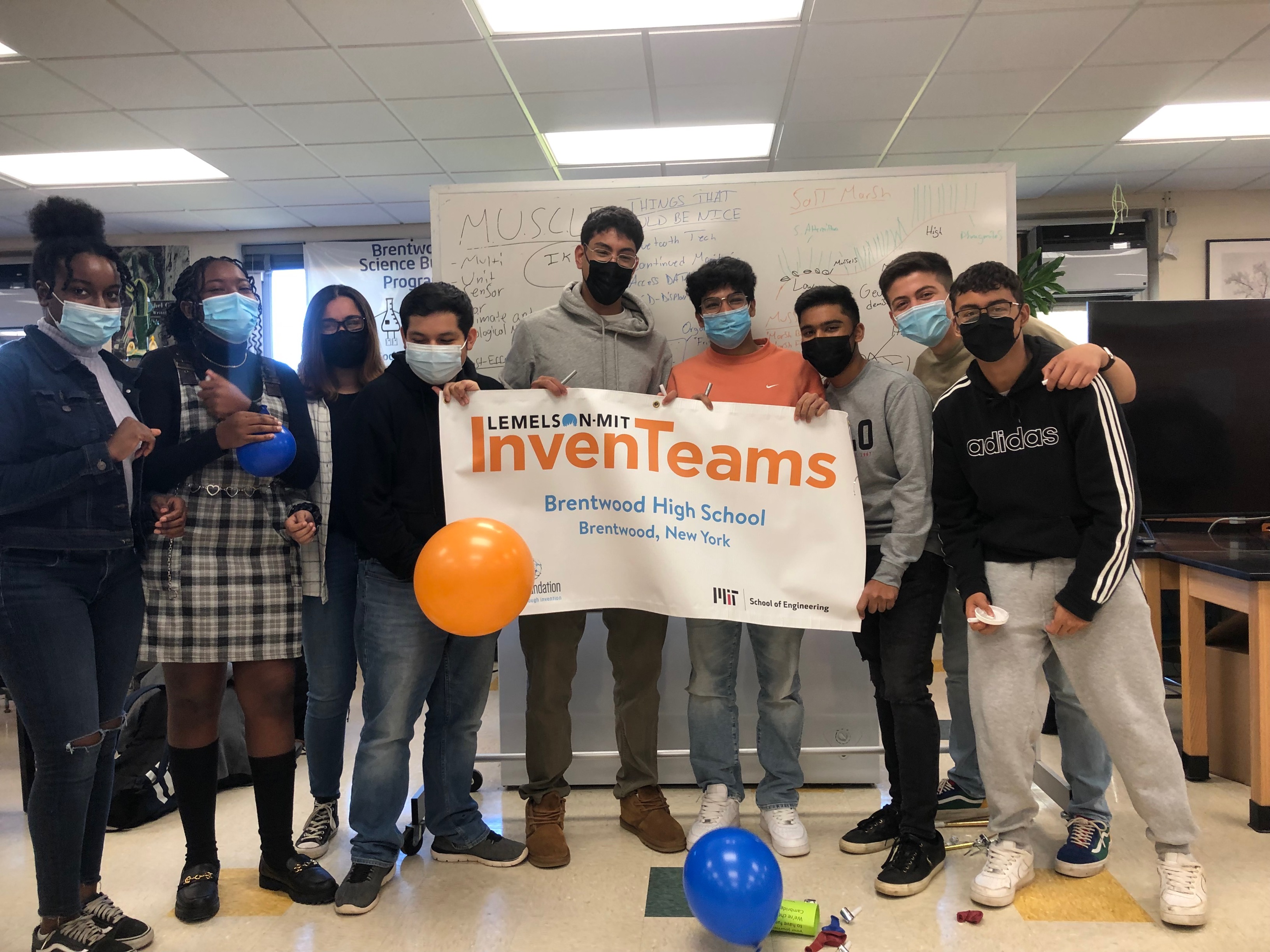 Brentwood High School InvenTeam with their InvenTeams banner